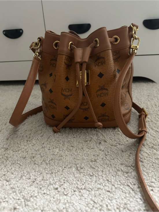 MCM Handbags - MCM cognac mini bucket sling bag